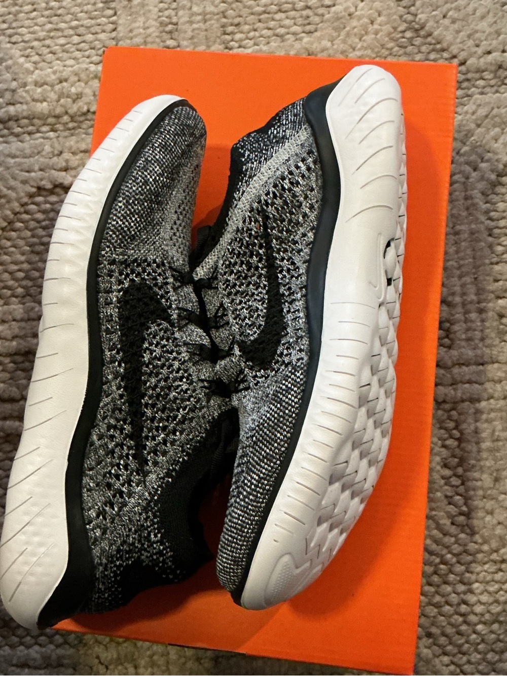 Nike Women's Black and White Flyknit Running Sneakers